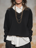 Stylish And Minimalist Black Shirt Layered Over A White Shirt