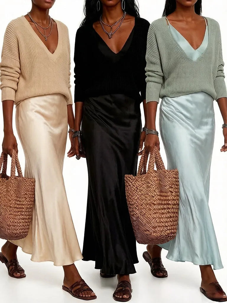 Effortlessly create an ivory knit satin midi skirt suit