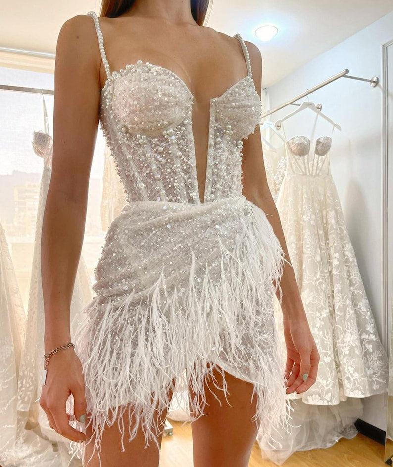 Beaded and sparkly feather mini dress. Short dress custom sewn to the bride's measurements.