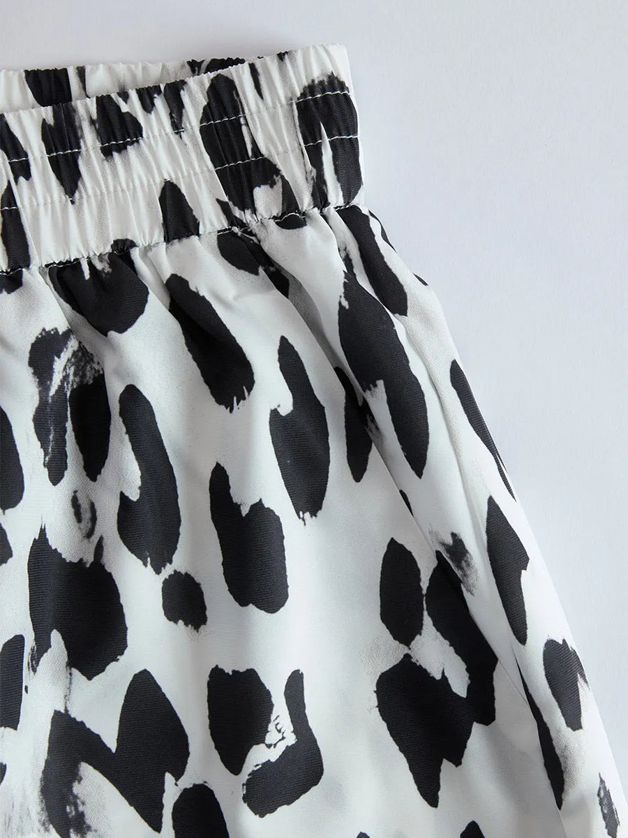 Modern And Stylish White T-shirt And Leopard Print Chiffon Pants Set